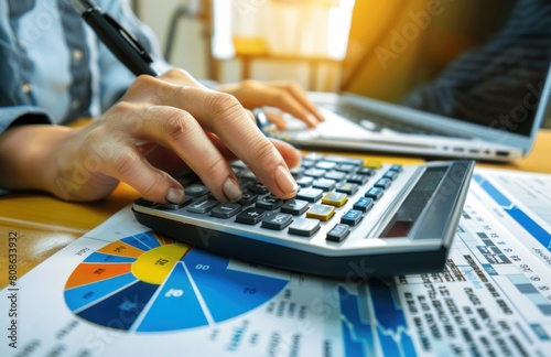 Close up of a business woman calculating finances, using calculator and laptop, holding receipt, female bookkeeper checking documents, paying bills