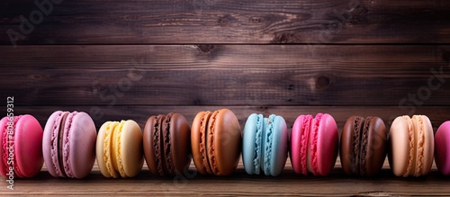 Wooden background with a charming image of macaron production allowing room for text or additional elements