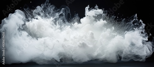 An abstract image of white powder exploding or being thrown creating a dynamic and visually captivating background with copy space
