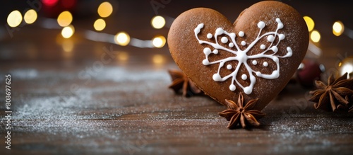 A heart shaped chocolate gingerbread Christmas cookie with a spicy taste is a sweet dessert that adds to the holiday celebrations It can be enjoyed as a snack on the table enhancing the festive food