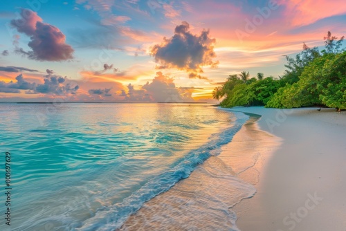 Tropical beach with vibrant sunset sky