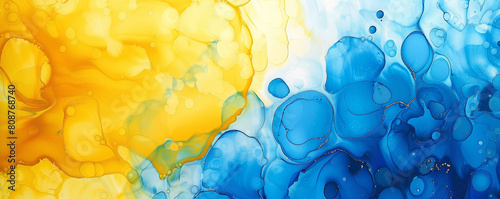 Abstract painting background in shades of lemon yellow and cobalt blue, alcohol ink with oil paint texture.