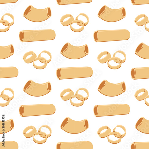 A pattern of different types of pasta. Chopsticks, hollow circles for culinary themes inspired by Italian cuisine. Homogeneous texture of several versions of flour pasta made from Italian flour
