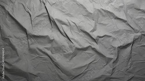 A crumpled up piece of gray cloth
