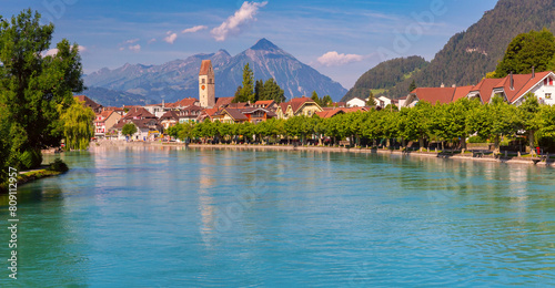 Panoramic view of Old City of Unterseen with Church and Aare river, Interlaken, Switzerland