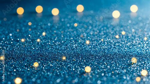 Festive blue background with brilliant blue scattering of small stones, bright golden particles and bokeh. Glitter Texture. Illustration for greeting card, carnival, holiday, celebration. Copy space.