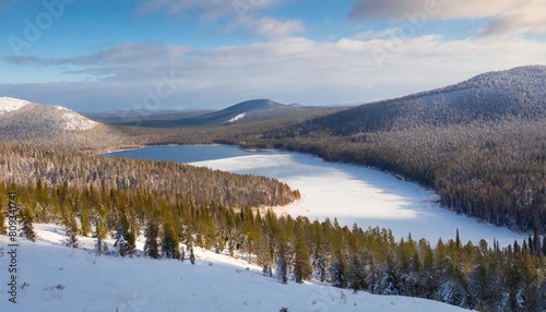 taiga forest landscape with a lake and hills in winter