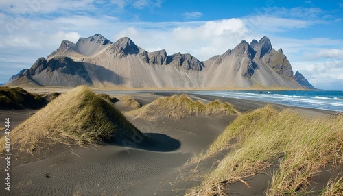 sand dunes on the stokksnes on southeastern icelandic coast with vestrahorn batman mountain iceland europe