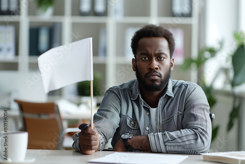 Burnt Out Black Man Waving White Flag at Work Quiet Quitting