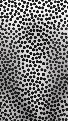 Black polka dots scattered over a gradient grey backdrop. Background. Wallpaper.