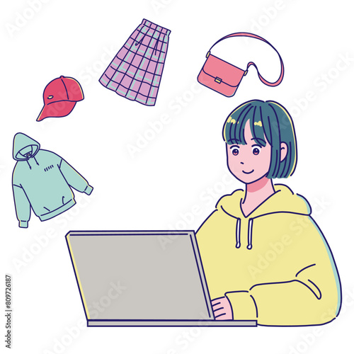 パソコンで洋服を買う・売る女の子