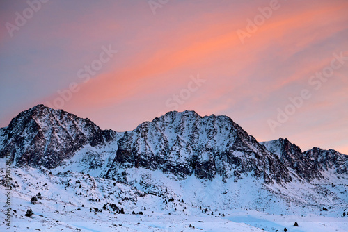 Sunset on the snow-capped mountains in Porta