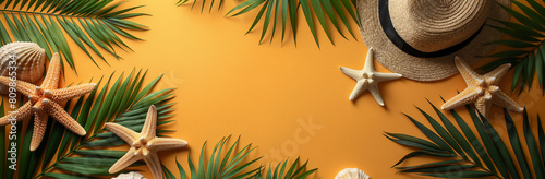 Close up of straw hat, leaves of palm and sea stars on yellow background with copy space for text. Banner. Summer vibes concept 