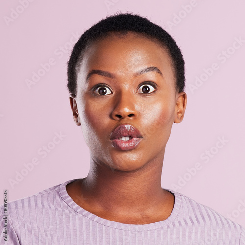 Studio, surprise or black woman with shock, fear and wow expression for news, sale or gossip. Pink background, open mouth or face of scared African girl in disbelief for announcement or discount deal