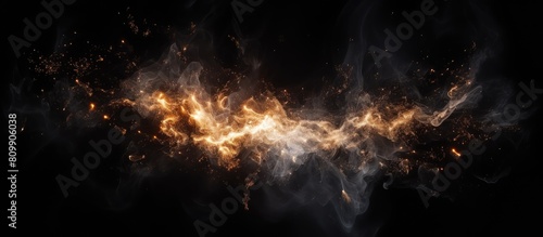 A Christmas fire spark with a black background providing ample copy space for image placement