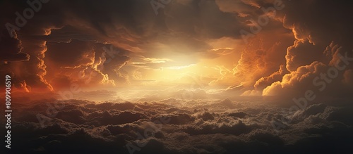 Sunrise with epic storm clouds captured in a detail shot providing ample copy space image