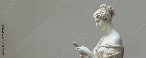Ancient meets modern: statue with smartphone