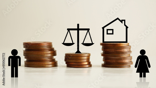 Marital property. Husband and wife divide a house in a divorce process. Fair marital property division Agreement
