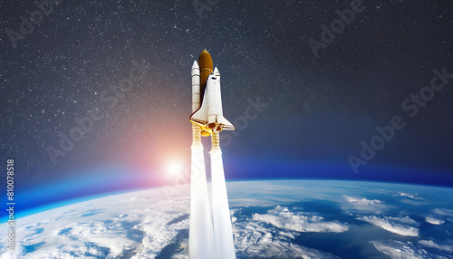 Space shuttle at launch into earth orbit. Aerospace technology and science wallpaper.