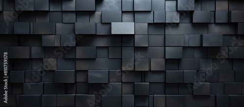 Arrangement of varied black mosaic tiles forming a background pattern Copy space image available