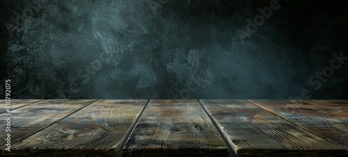 Wooden table in a dark room background concept for advertising
