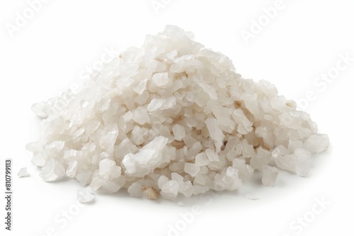 Close-up view of a pile of natural sea salt crystals isolated on a white backdrop, highlighting culinary and health themes