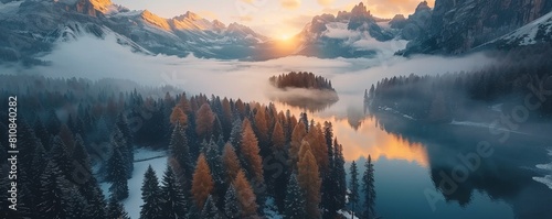 Aerial view of Misurina Lake coastline with forest along the coast at sunset, Auronzo di Cadore, Dolomites, Veneto, Italy.