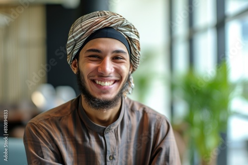 Smiling Muslim man wearing a white turban Fictional Character Created By Generative AI. 