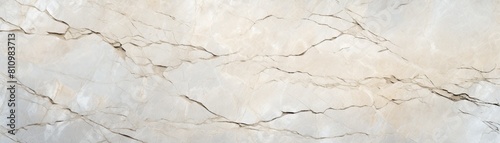 A close up of a marble surface with cracks.