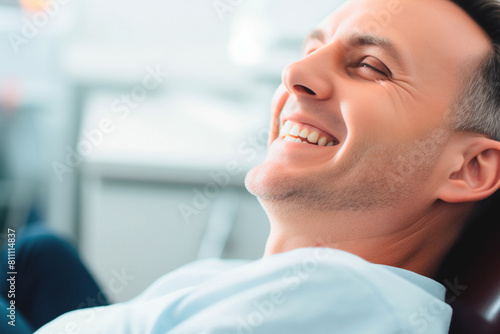 Sophisticated gentleman sporting well-maintained smile in dental room. Dental health plan