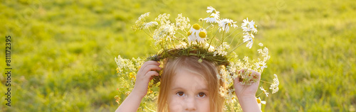 floral crown adorns head child, happy girl in wreath, floral crown, green sunlit meadow, beauty nature and arrival summer, Midsummer celebration, tranquility nature, conveying sense awe, peace