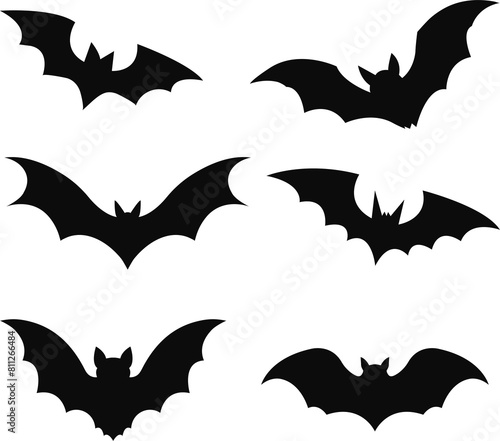 Black silhouettes of bats set on white background.