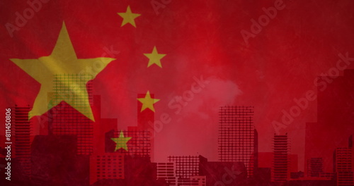 Image of cityscape over flag of china