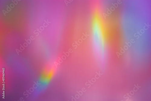 Sunlight background, abstract photo with sunshine and rainbow flare, vivid colored minimal photo. Prism light and caustic effects texture, trendy aesthetic view diffraction sunbeams, blur glow