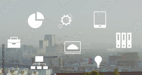 Image of multiple icons over modern cityscape against clear sky
