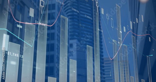 Image of statistical data processing against view of tall buildings