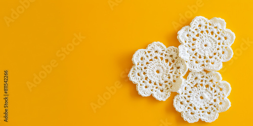 Crochet doilies on a yellow background.