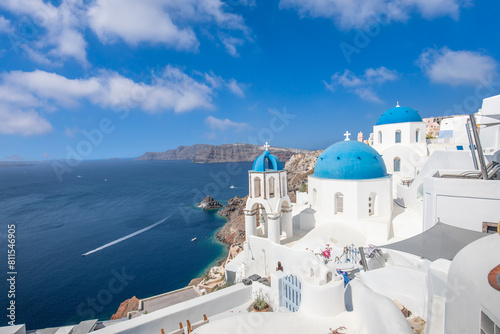 Santorini island, Greece. Picturesque romantic summer landscape on Santorini. Oia village in the morning light. Amazing view with white houses. Island of lovers, vacation and travel tourism background