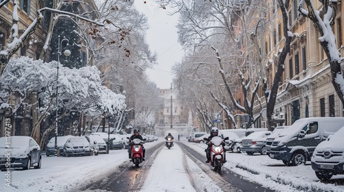 beautiful snowy day in Rome, Italy: a view of snow-covered motorcycles near Altare della Patria and Fontana dell'Aracoeli
