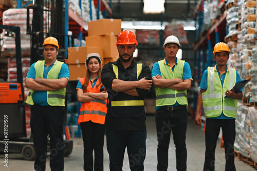 Multiracial Warehouse workers logistic team working in warehouse for industry business or shipping management