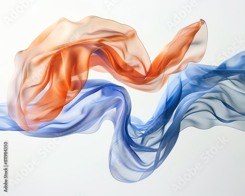 Two pieces of silk, one orange and one blue, are flowing in the air