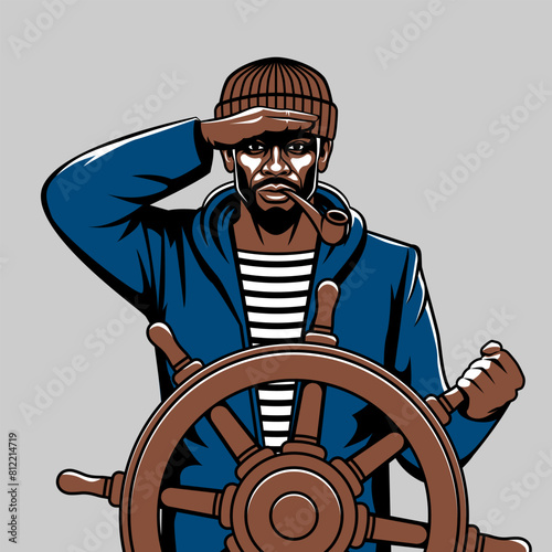 Black male fisherman looks into distance standing at helm of boat