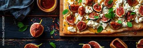 Goat cheese and fig flatbread with honey, top view horizontal food banner with copy space