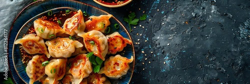 Pork dumplings with soy dipping sauce, fresh food banner, top view with copy space