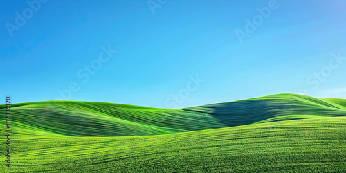 Emerald Green Hills of Tuscany: The rolling emerald green hills of Italy's Tuscany region provide a breathtaking view against the bright blue sky. This serene landscape evokes feelings of peace