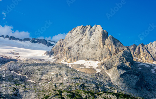 the last snow at the end of Spring and beginning of Summer in the Dolomite mountains on the Marmolada glacier