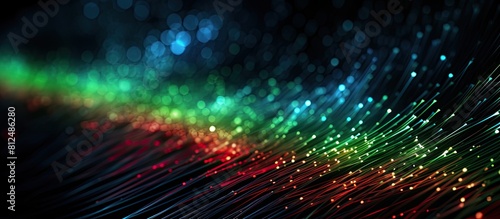 A captivating copy space image with a vibrant mix of green and red fiber optics against a high tech background
