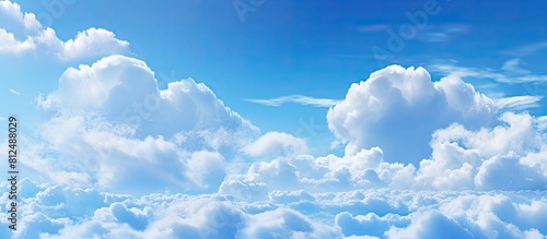 Blue sky with clouds providing a copy space image