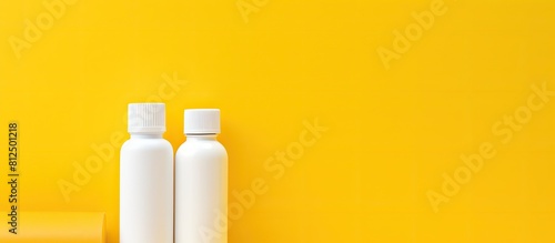 A stationery item specifically a PVA glue bottle is showcased on a vibrant yellow background providing ample copy space for additional elements in an image