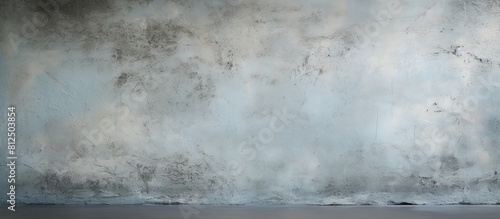A weathered piece of concrete wall with a worn stucco texture creates the backdrop of this image with empty space. Creative banner. Copyspace image